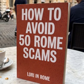 The book cover on a cafe table in Rome